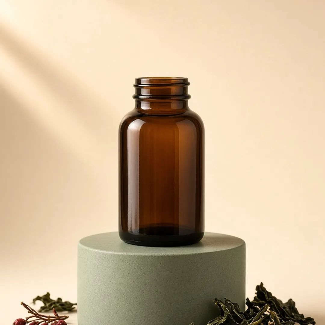 Amber supplement bottle on a sage green pedestal with seaweed and berries – Thyrafemme Balance thyroid support