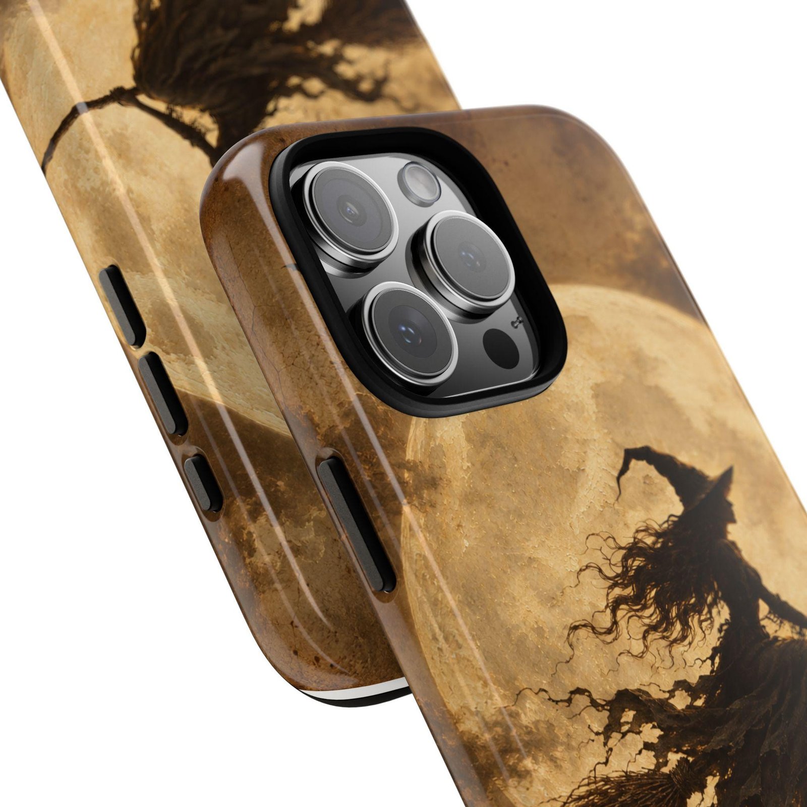 Close-up of a sepia phone case with a witch flying on a broomstick across a full moon